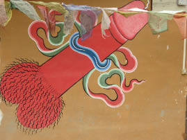 Paintings on houses in Metshina