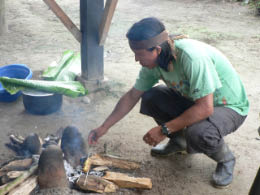 Abel cooking the grubs